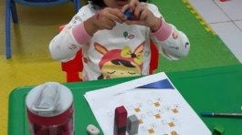 child engrossed in science activity