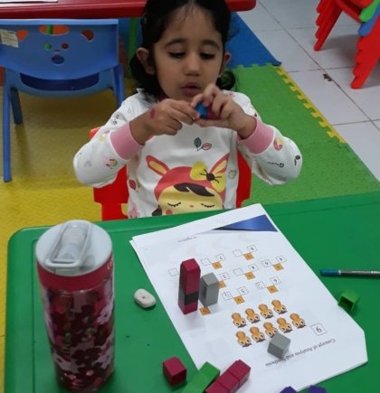 child engrossed in science activity